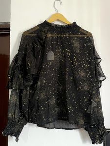 Elegant Black Star Print Ruffle Top