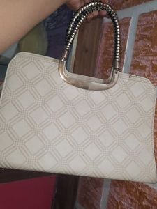 Chic Off-White Textured Handbag