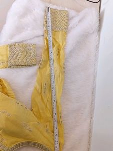 Yellow Embroidered Peplum Blouse