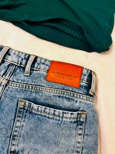Womens Blue Jeans and green fitted top