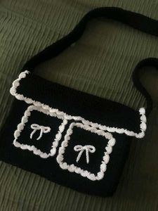Crocheted Black Shoulder Bag with Bows