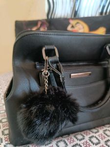 Stylish Black Handbag with Fur Pom-Pom