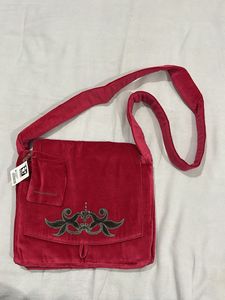 Velvet handbag with embroidery