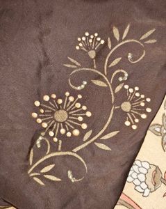 Stylish Brown Sleeveless Top with Embellishments