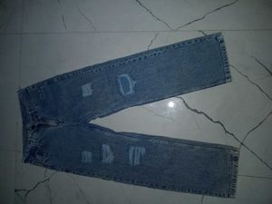 Ripped Blue Denim Jeans