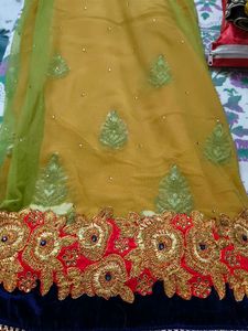net embroidery saree with velvet blouse