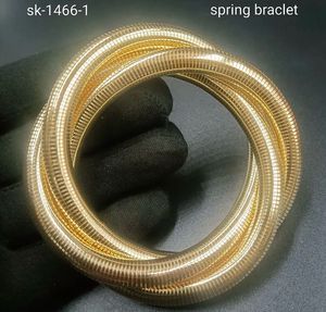 woman’s gold bracelet