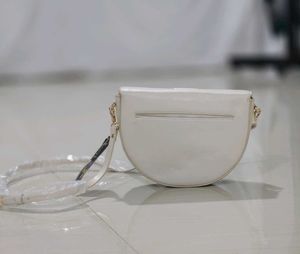 Baggit half moon sling bag