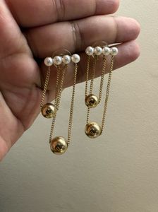 Gold Tone Pearl Drop Chain Earrings