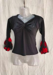I. Stylish Black Top with Bell Sleeves