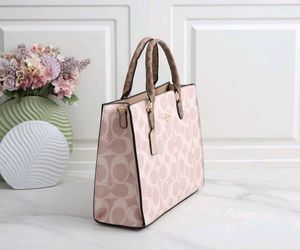 COACH**12A QUALITY HANDBAG* AT OFFER PRICE