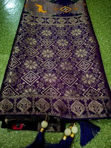 Elegant Purple Silk Saree with Intricate Gold Weav