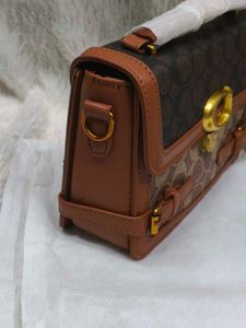 Stylish Coach Handbag Rust 🧡