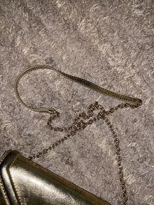 MANGO Gold sling Bag