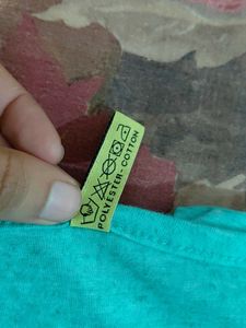 A turquoise/teal T-shirt