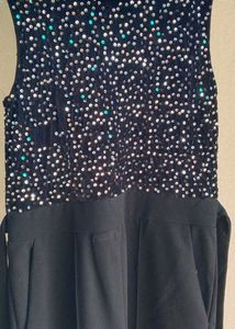 Black sequence jumpsuit with pockets.✨Like new