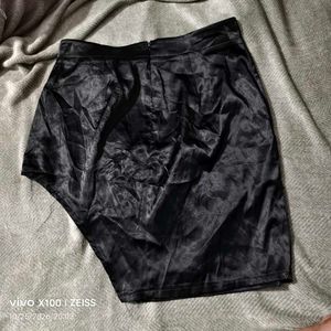 352510. Sleek Black Satin Skirt
