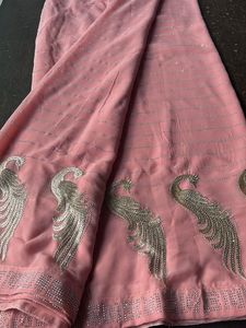 Elegant Pink Saree with Peacock Design