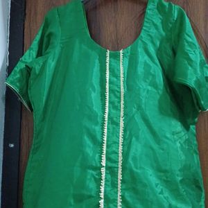 Green silk color kutra with lace in front. perfect for mending functions.  custom made..size 42.never worn
