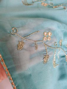 Beautiful Teal Saree with Gold Embroidery