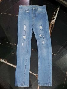 Ripped Light Wash Denim Jeans