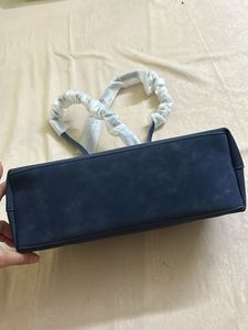 classy navy blue leather suede bag