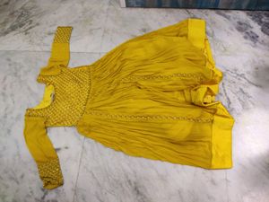 Yellow gown with heavy work