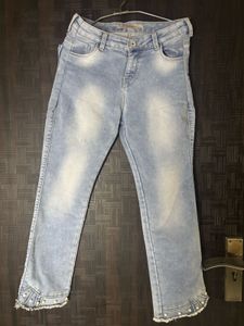 Light Wash Denim Jeans with Pearl Embellishments