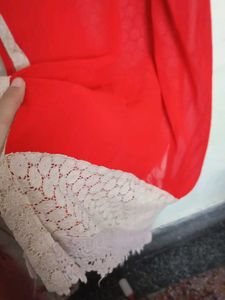 Elegant Red Kurta with Intricate Embellishments