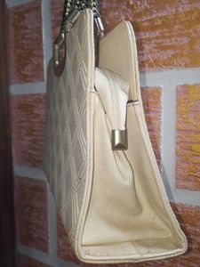 Chic Off-White Textured Handbag
