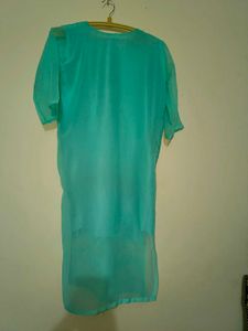Elegant Teal Saree with Intricate Border