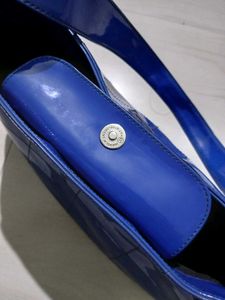 Authentic Tomboy  Blue HandBag Patent leather 100%