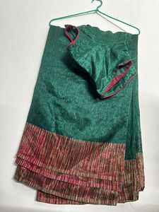 Elegant Green Saree with Red Border