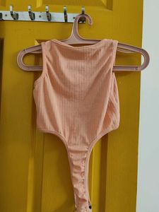 Peach Ribbed Bodysuit