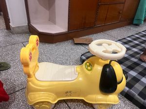 Yellow Dog Ride-On Car