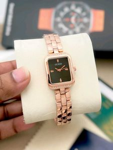 Elegant Gold Tone Guess Watch