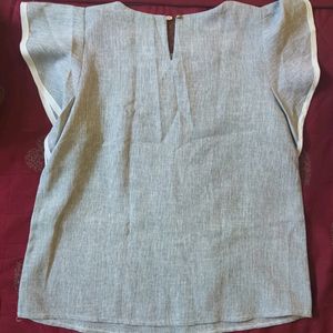 Grey ruffle top