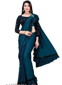 Stunning Teal Saree with Sequined Blouse