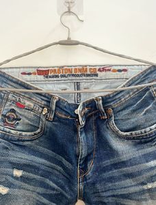 Distressed Denim Jeans