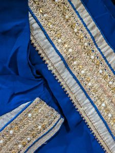 Elegant Blue Saree with Embellished Blouse