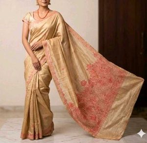 Elegant Golden Saree with Pink Embroidery