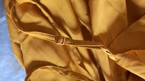 Today's Offer ₹150 Berrylush Women Solid Yellow Front Twist Knot Fit &amp; Flare Mini Dress For Women (Mustard Colour)