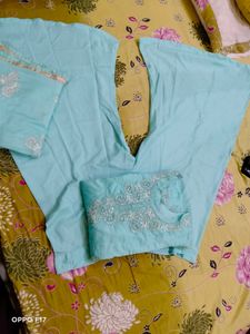 stitched suit with zipper storage  packet.