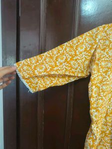 Yellow Printed Kurta with Neck Embellishment
