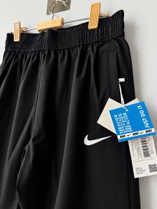 Nike Black Swoosh Track Pants