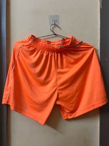 orange jersey with shorts