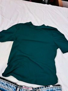 Womens Blue Jeans and green fitted top