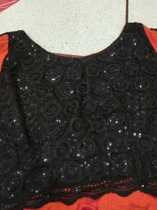 Orange &amp; Black Blouse with circular skirt wit