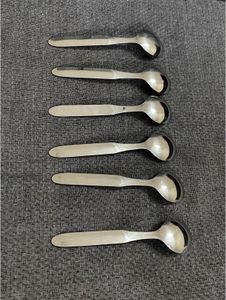 Set of 6 Stainless Steel Bowls and spoon