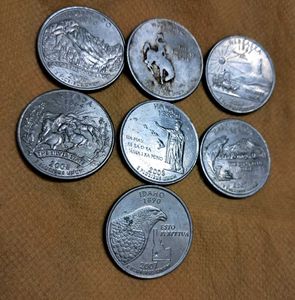 7 Commemmorative USA quarters